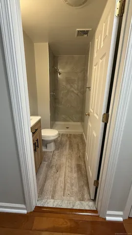 a bathroom with a sink and a toilet