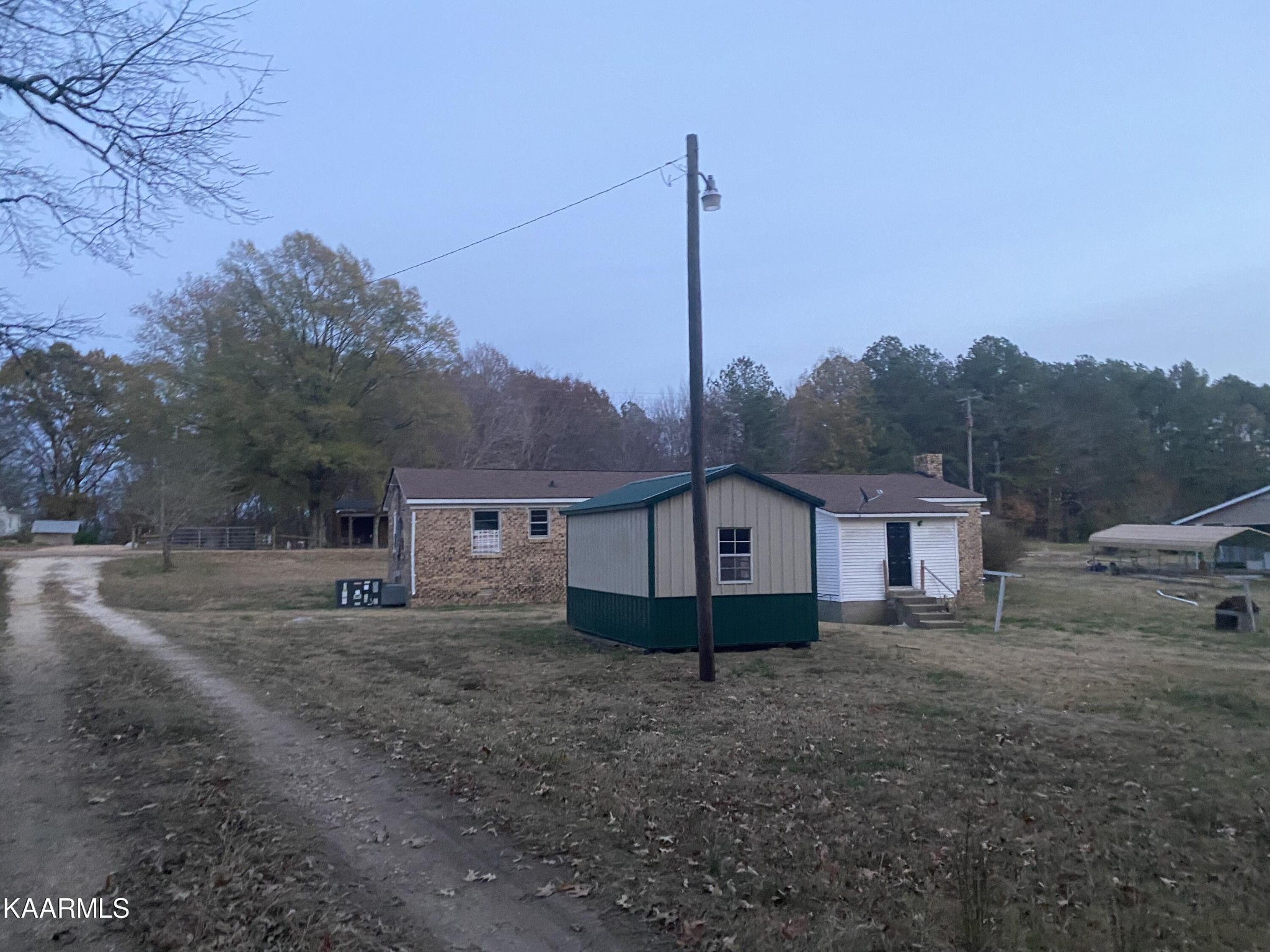3575 Foundry Hill Road Puryear, TN 38251 - Photo 13 of 13 a view of a house with a park