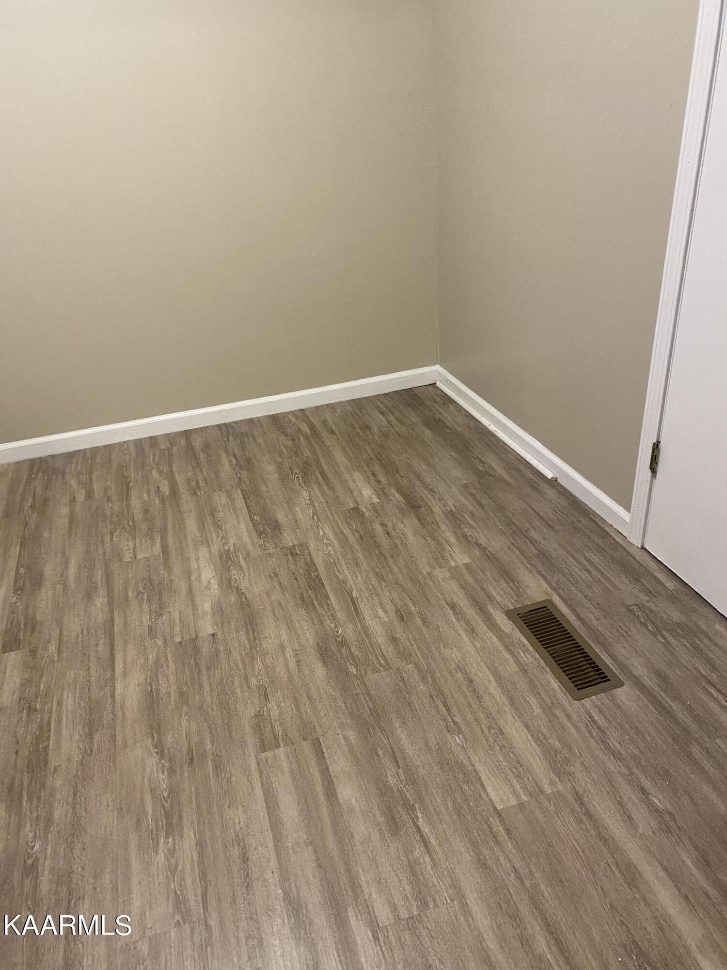 3575 Foundry Hill Road Puryear, TN 38251 - Photo 4 of 13 a view of wooden floor in a room