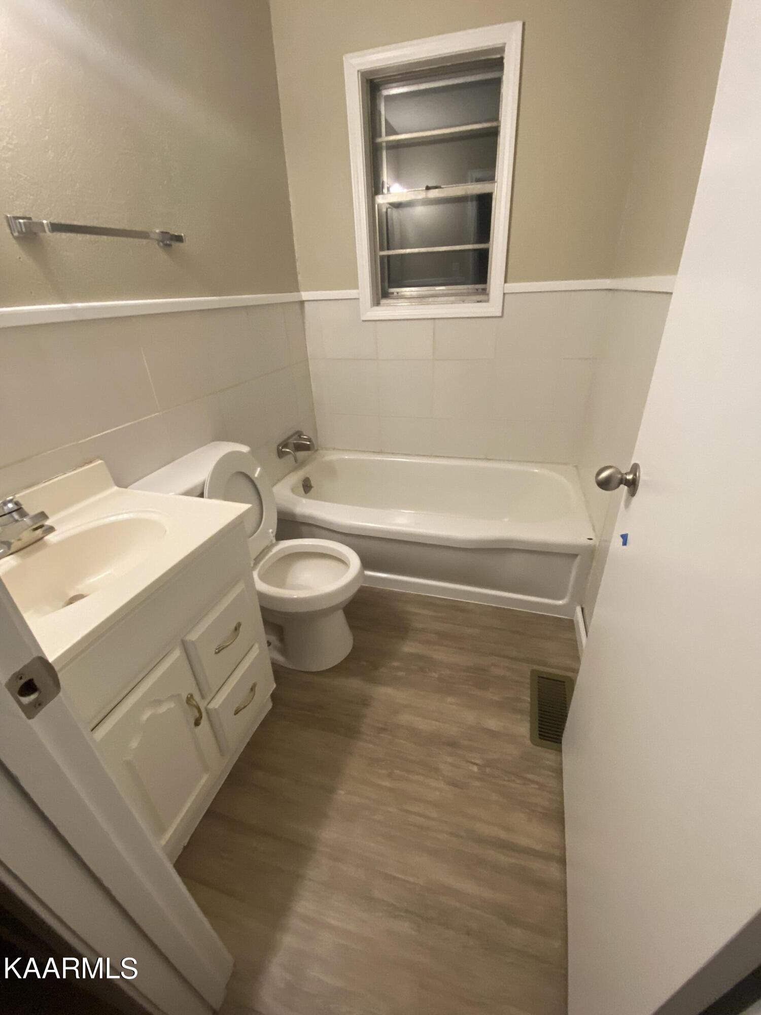 3575 Foundry Hill Road Puryear, TN 38251 - Photo 6 of 13 a bathroom with a toilet sink and mirror