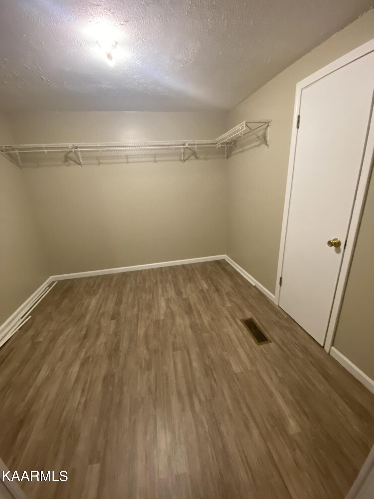 3575 Foundry Hill Road Puryear, TN 38251 - Photo 9 of 13 a view of a room with wooden floor
