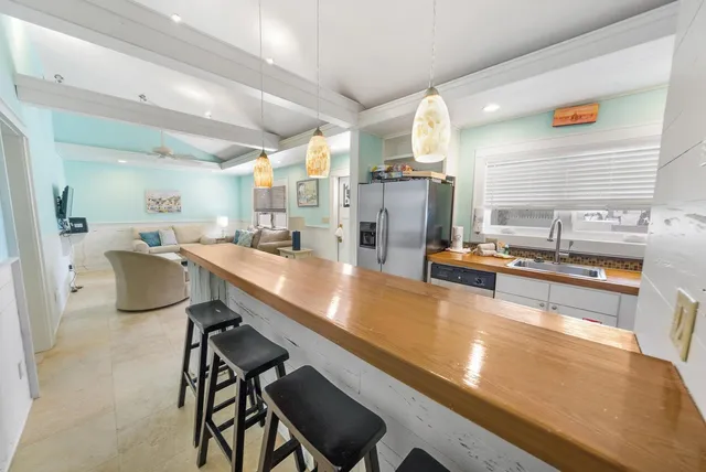 a kitchen with sink cabinets and counter space