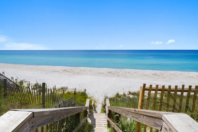 a view of a balcony with an ocean view