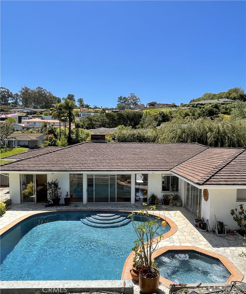 28752 Crestridge Road Rancho Palos Verdes, CA 90275 - Photo 1 of 1 View of pool and house from top of hill