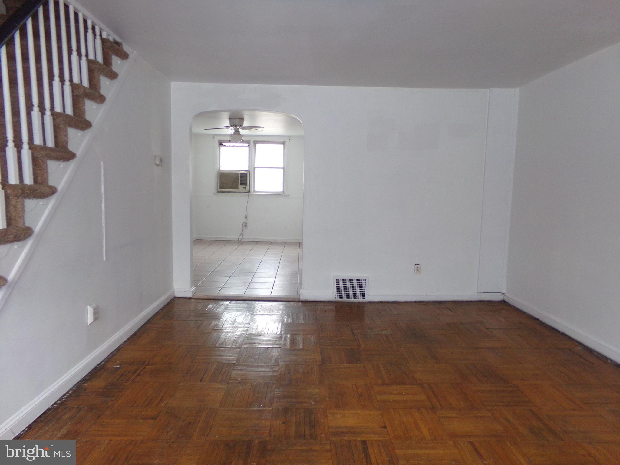 Living room with hardwood flooring