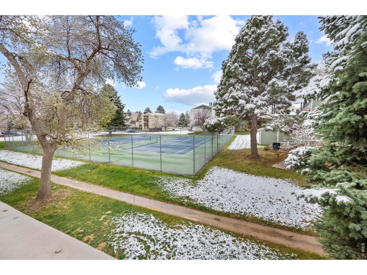3400 Stanford Road, Unit B223 Fort Collins, CO 80525 - Photo 32 of 34 a view of a yard with wooden fence