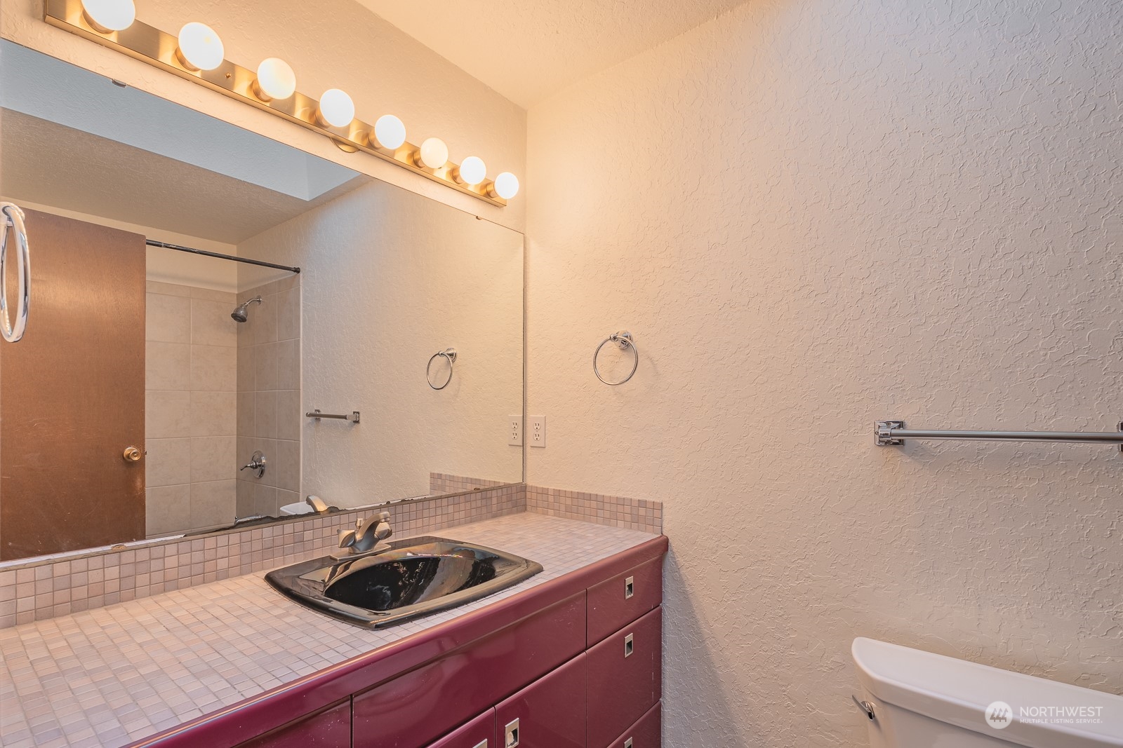19628 35th Avenue Southeast Bothell, WA 98012 - Photo 15 of 31 a bathroom with a sink and vanity
