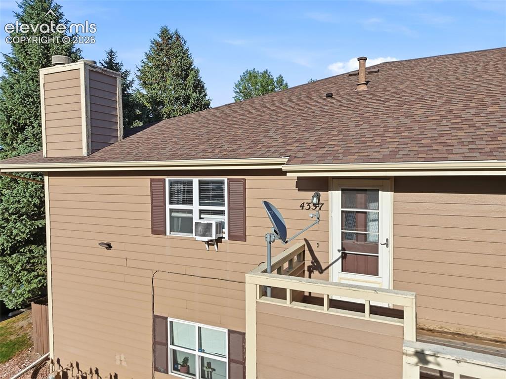 4357 Hunting Meadows Circle Colorado Springs, CO 80916 - Photo 20 of 20 a view of a house with a balcony