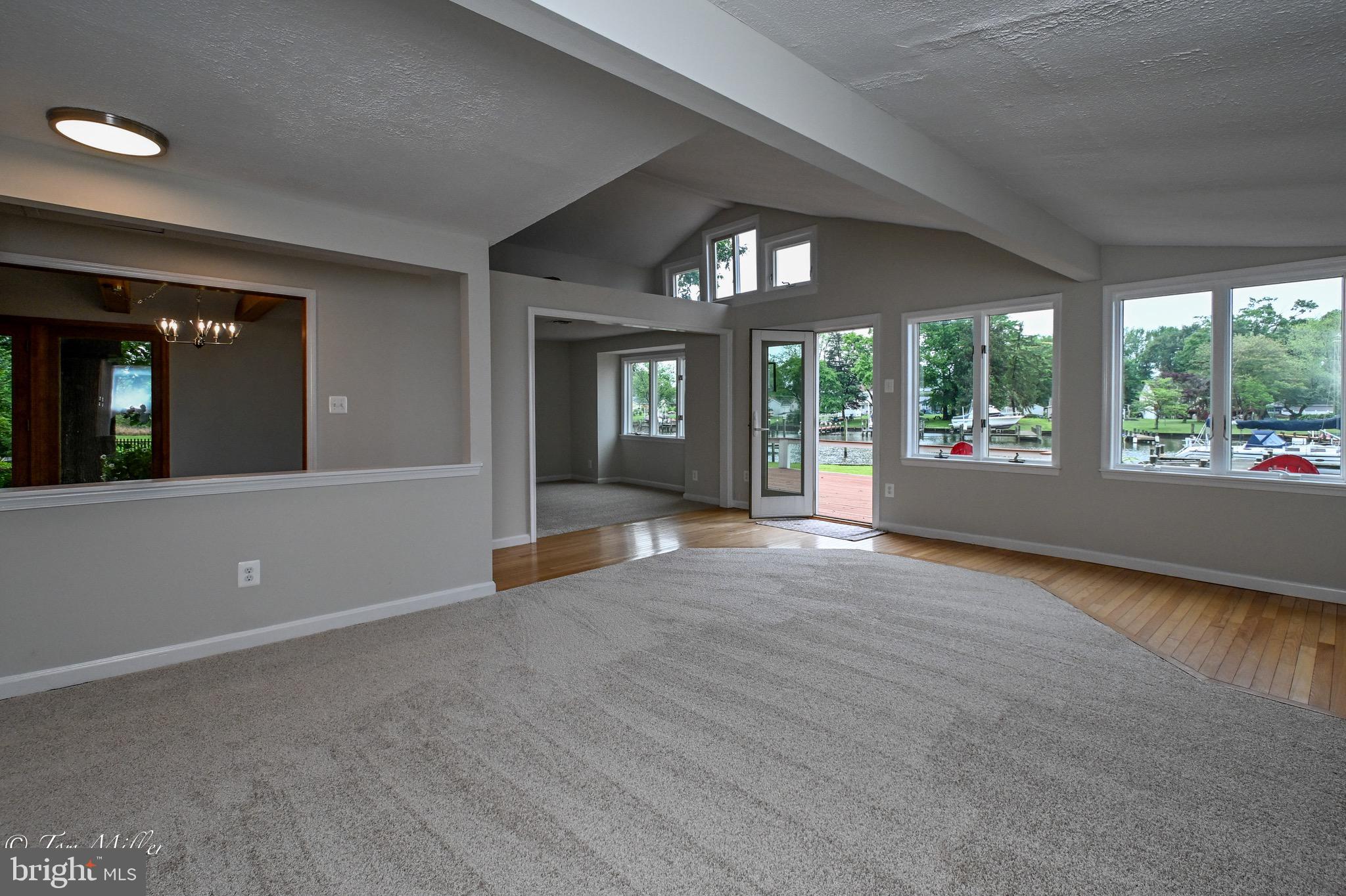 1135 Beech Drive Baltimore, MD 21220 - Photo 12 of 53 wooden floor in an empty room with a window