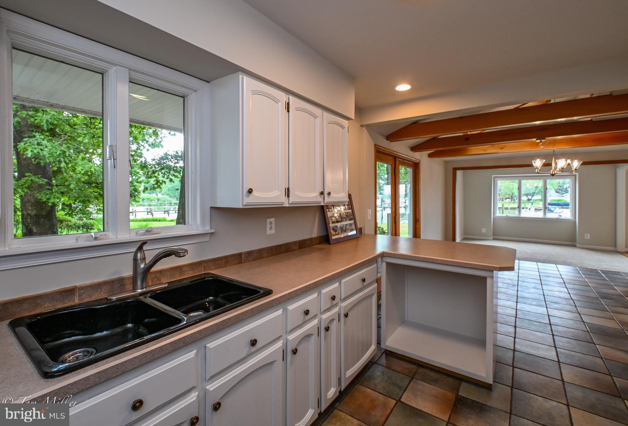 1135 Beech Drive Baltimore, MD 21220 - Photo 19 of 53 a kitchen that has a sink and a stove