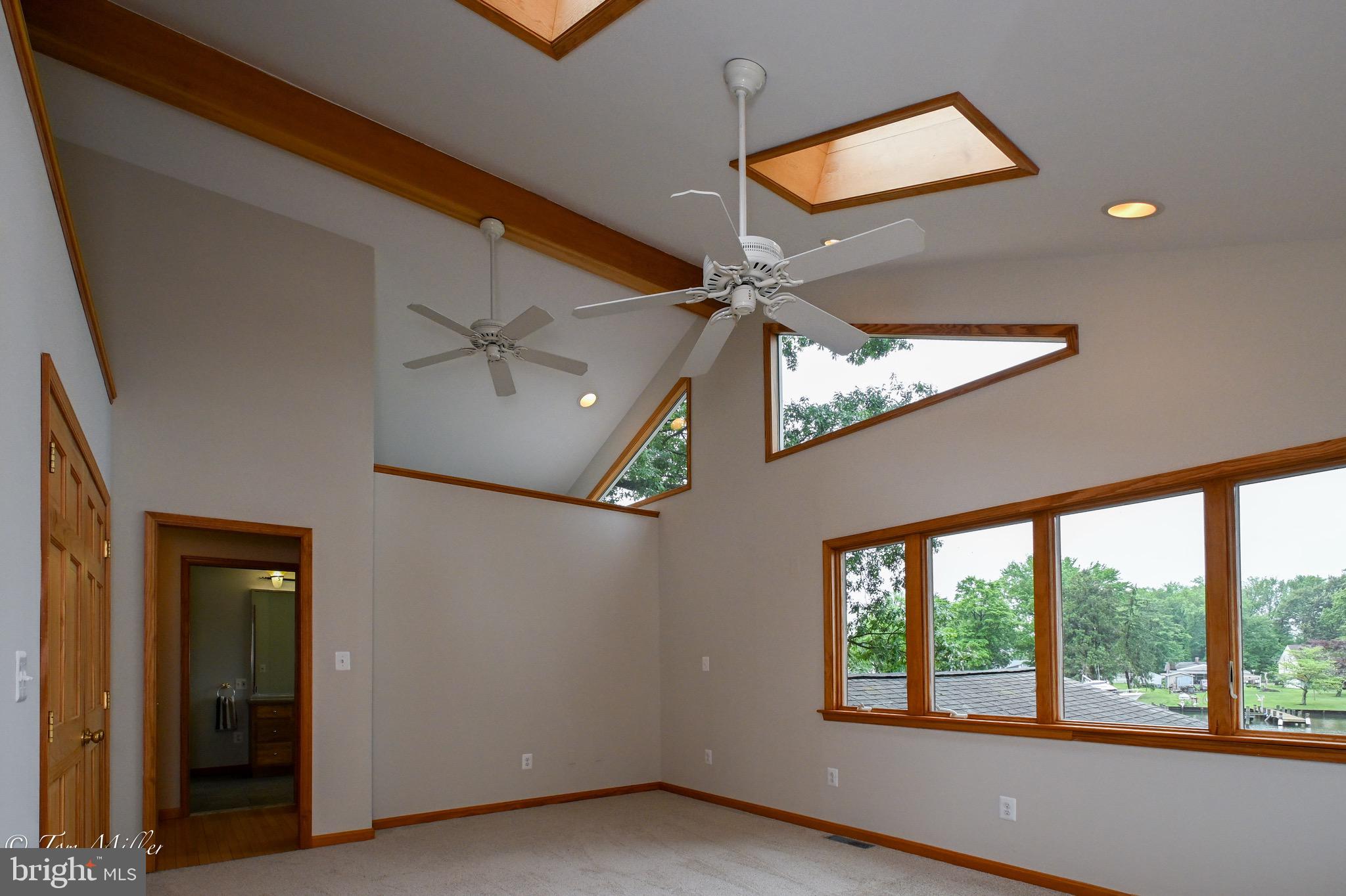 1135 Beech Drive Baltimore, MD 21220 - Photo 27 of 53 wooden floor in an empty room with a window