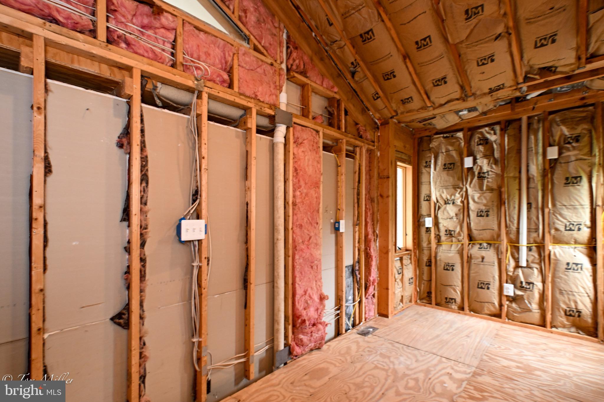 1135 Beech Drive Baltimore, MD 21220 - Photo 46 of 53 a view of a porch with wooden floor and a curtain