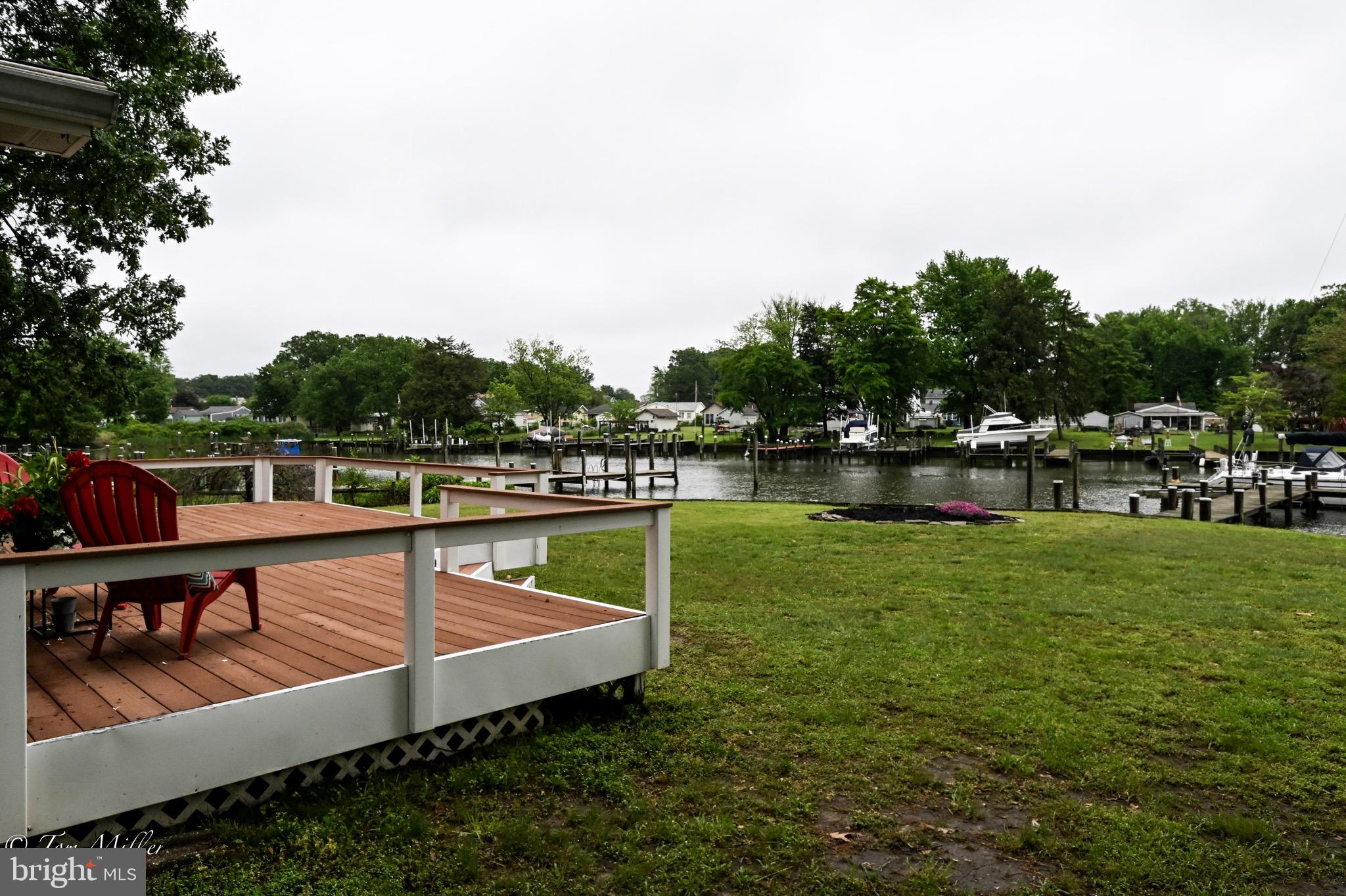 1135 Beech Drive Baltimore, MD 21220 - Photo 51 of 53 a view of a swimming pool with a garden and trees