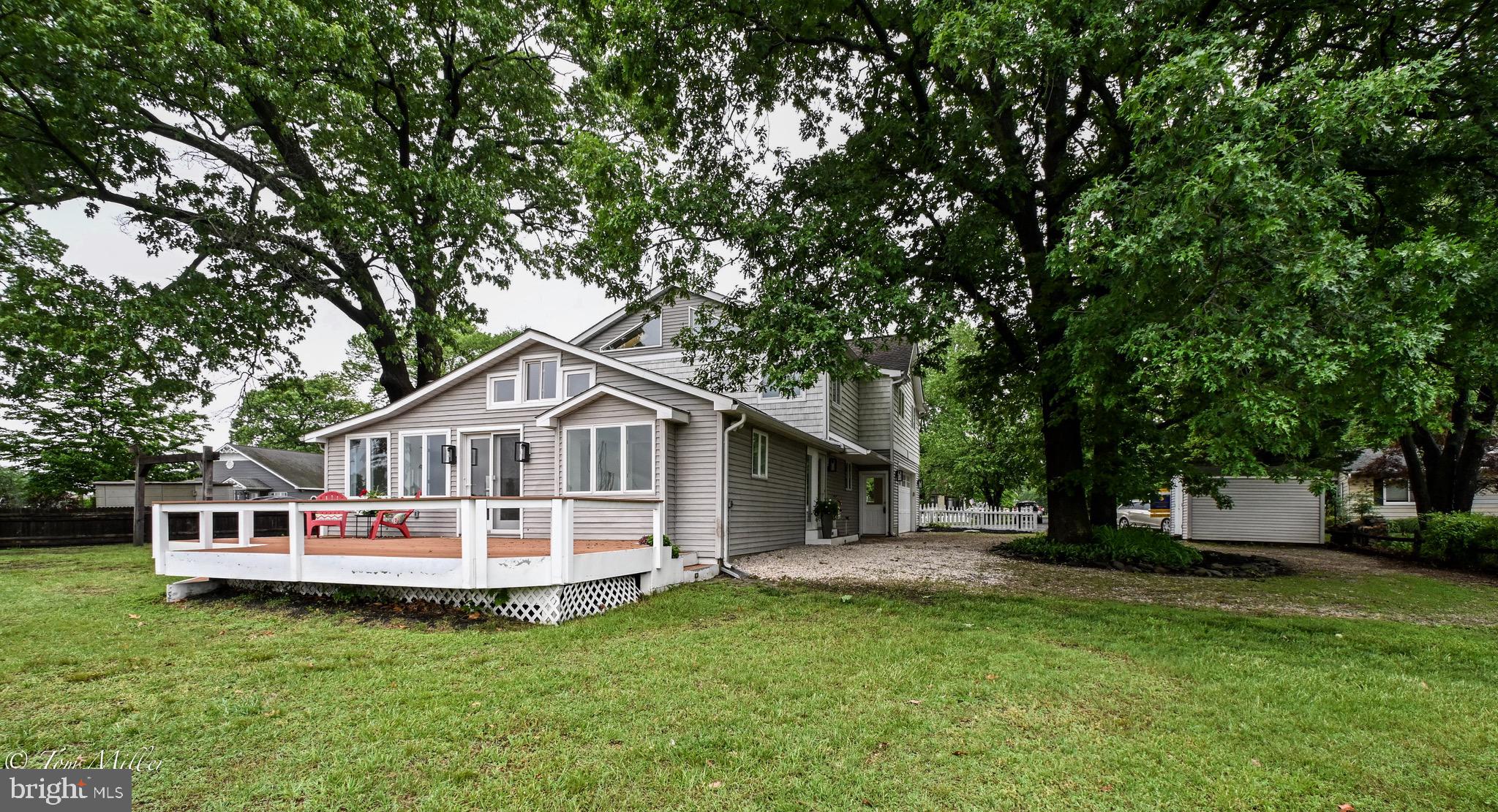 1135 Beech Drive Baltimore, MD 21220 - Photo 52 of 53 a house with a tree in front of it