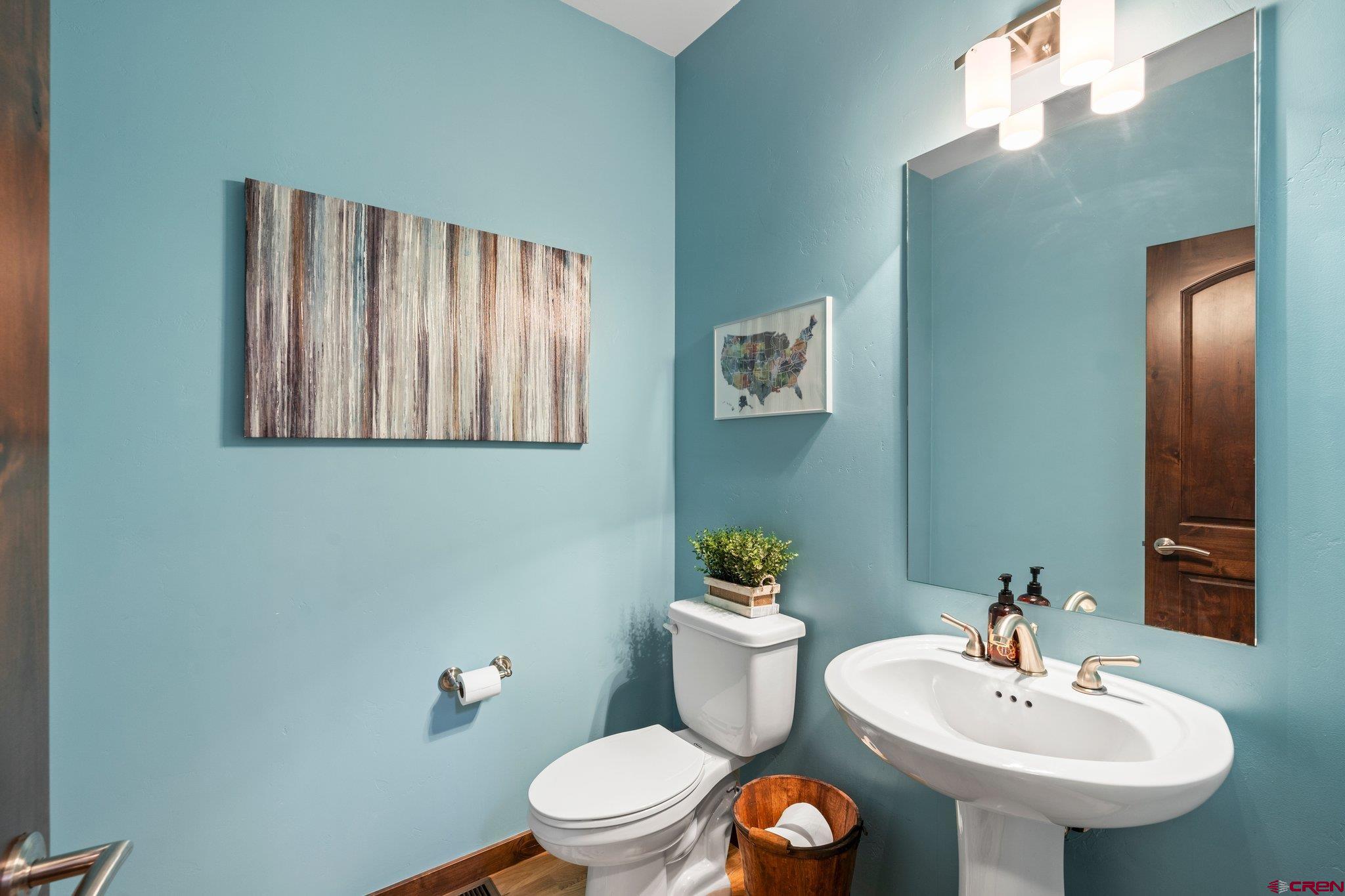 1422 Animas View Drive, Unit 25 Durango, CO 81301 - Photo 15 of 35 a white toilet sitting next to a bathroom sink