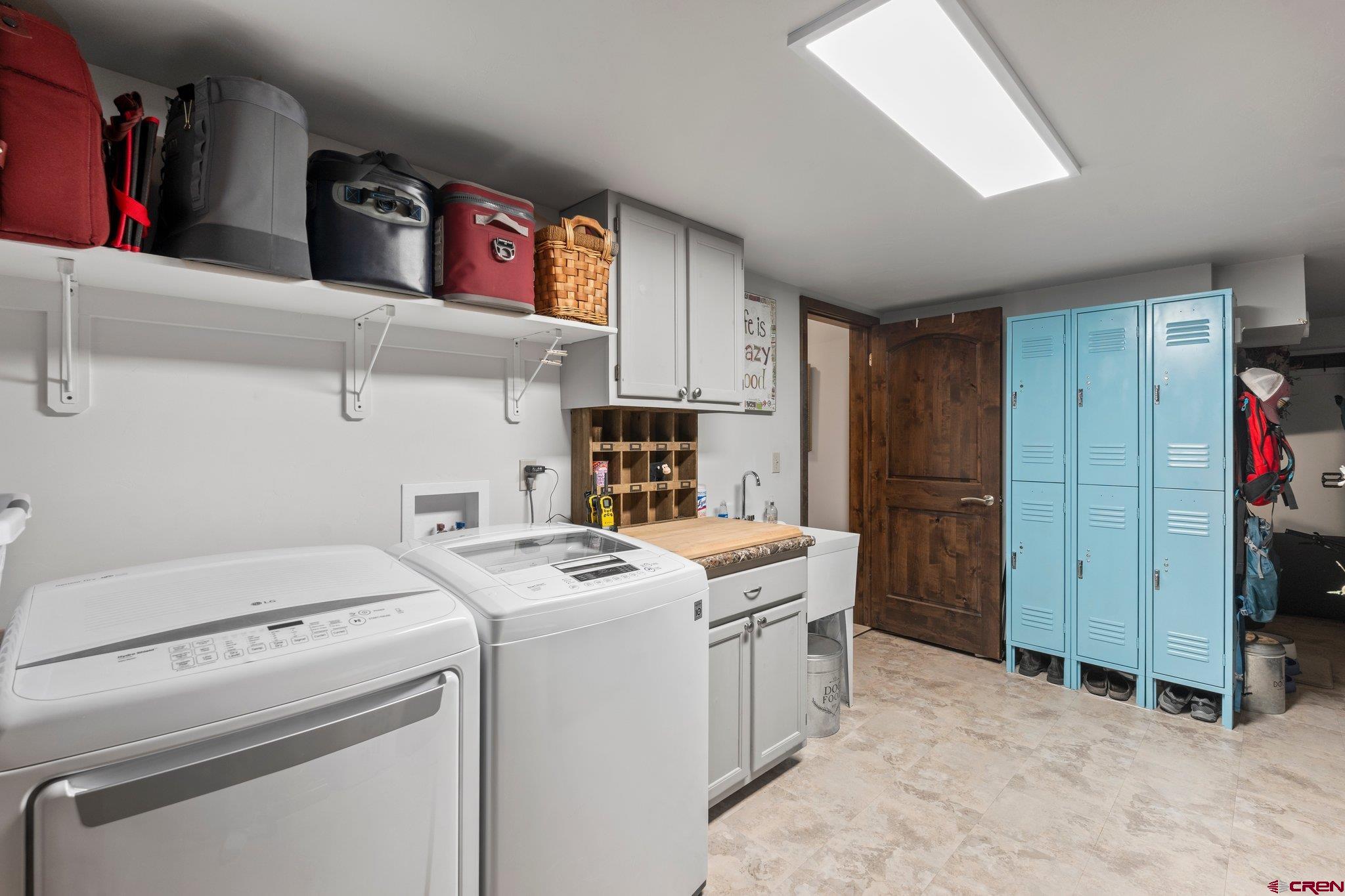 1422 Animas View Drive, Unit 25 Durango, CO 81301 - Photo 25 of 35 a utility room with dryer and washer