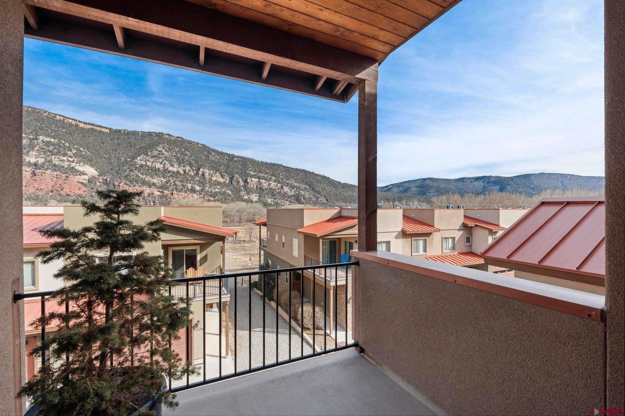 1422 Animas View Drive, Unit 25 Durango, CO 81301 - Photo 29 of 35 a view of a balcony with an ocean view