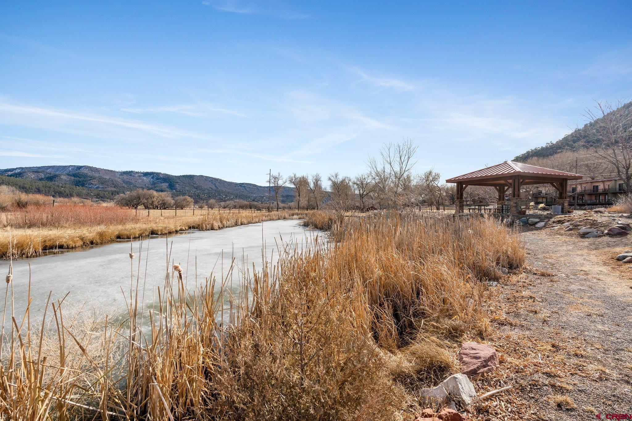 1422 Animas View Drive, Unit 25 Durango, CO 81301 - Photo 35 of 35 a view of lake with mountain in the background
