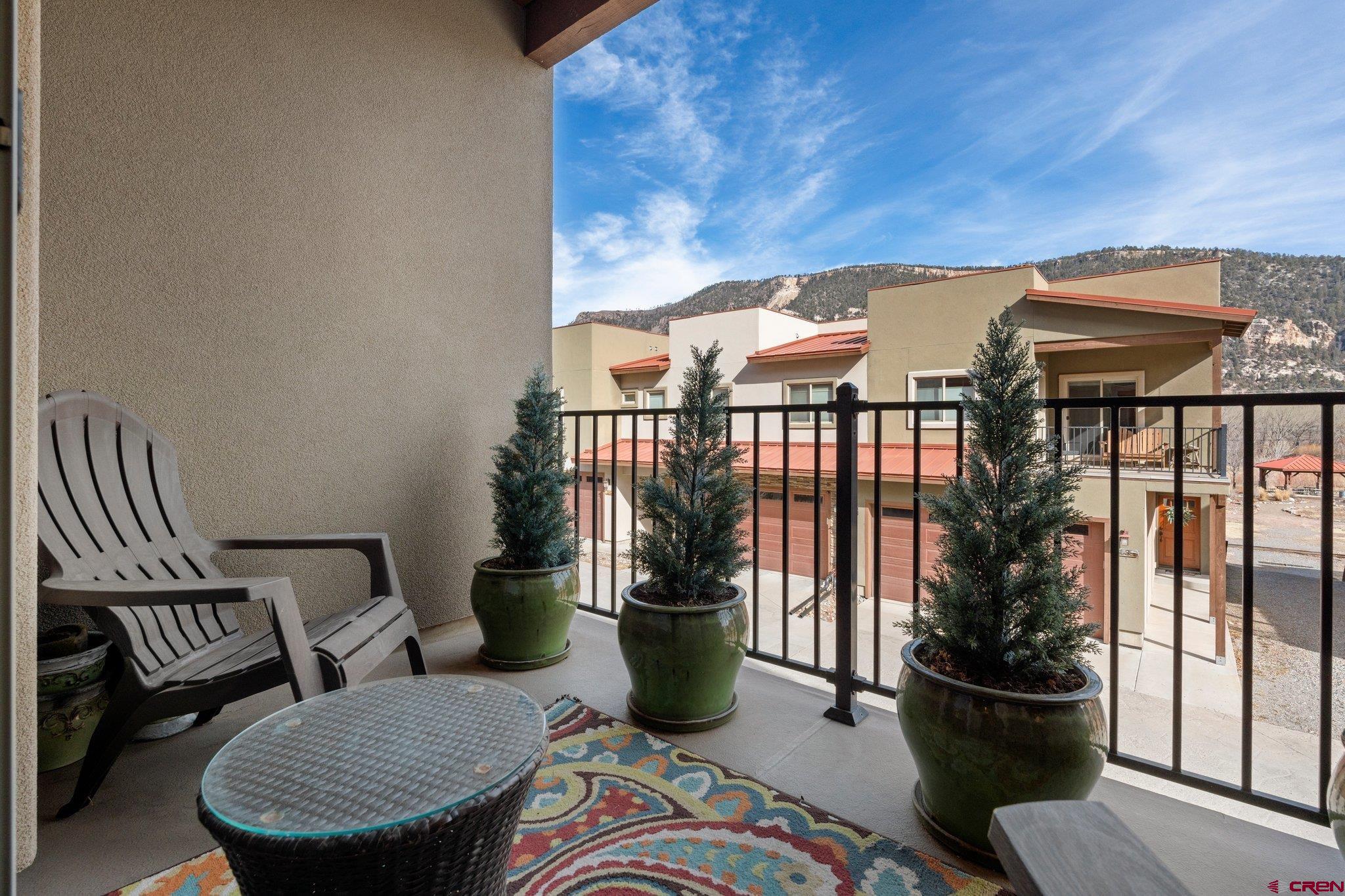 1422 Animas View Drive, Unit 25 Durango, CO 81301 - Photo 7 of 35 a view of a balcony with chairs