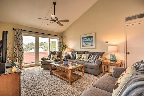 a kitchen with stainless steel appliances granite countertop a stove and a microwave