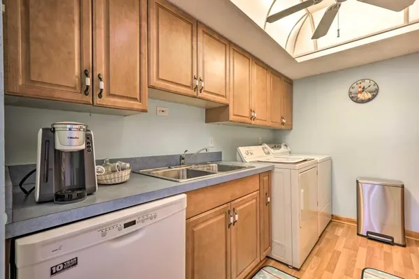 a white refrigerator freezer and a stove