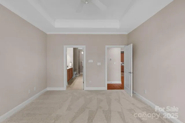 a view of a big room with closet and wooden floor