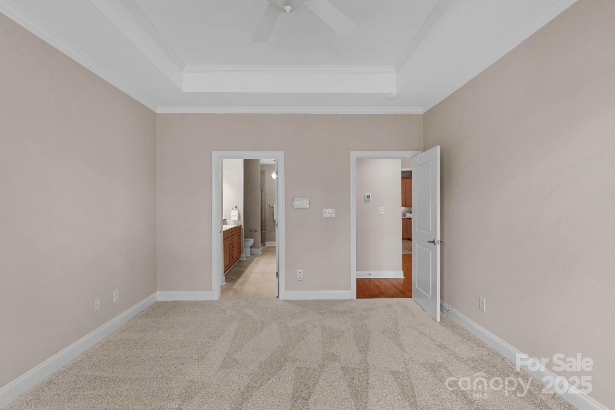 3038 Bellasera Way Matthews, NC 28105 - Photo 23 of 43 a view of a big room with closet and wooden floor