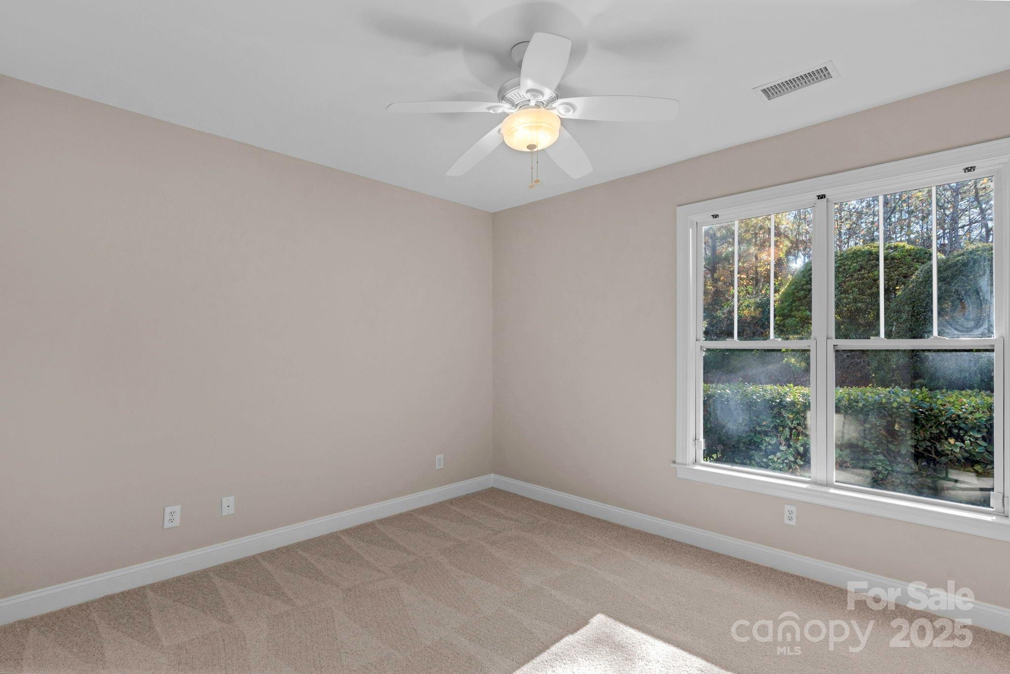 3038 Bellasera Way Matthews, NC 28105 - Photo 26 of 43 a view of an empty room with a window