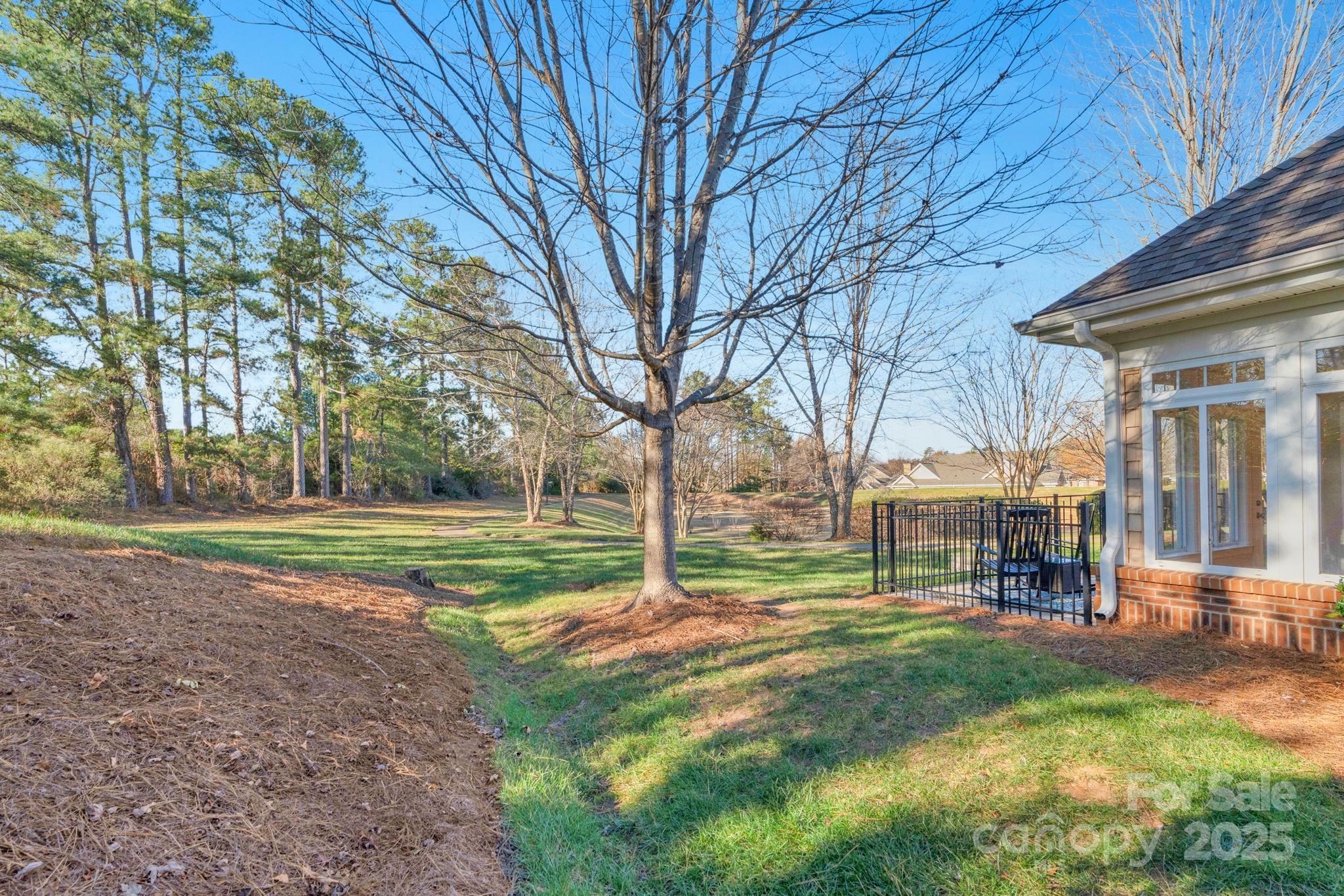 3038 Bellasera Way Matthews, NC 28105 - Photo 41 of 43 a view of a park with large trees