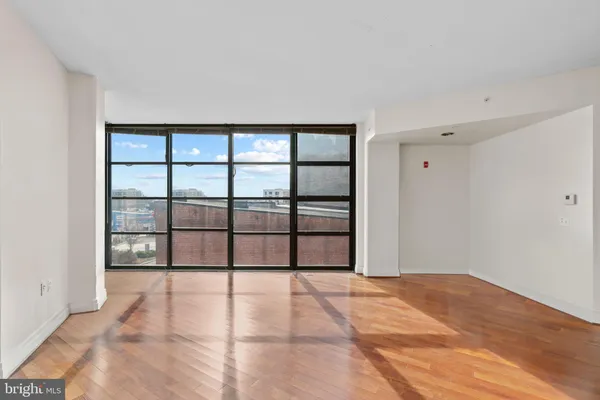 a view of a livingroom with a large window