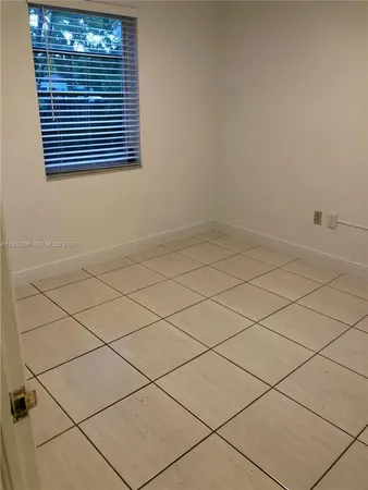 a view of a room and window
