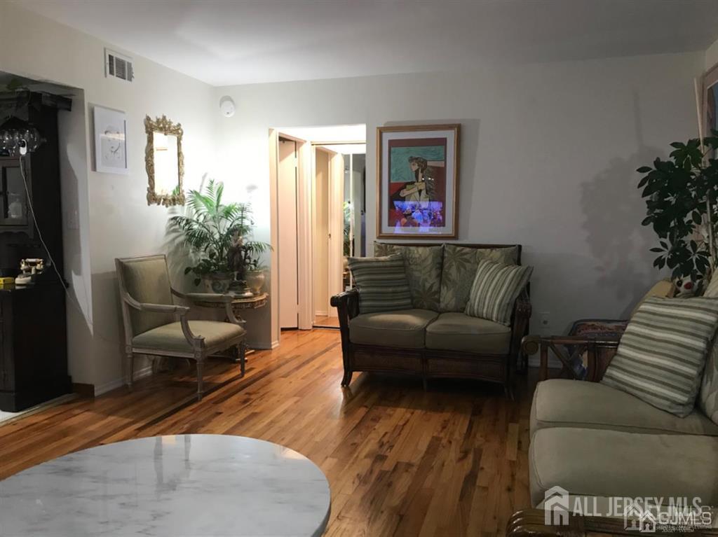197 Evergreen Road Edison, NJ 08837 - Photo 6 of 7 a living room with furniture and a couch