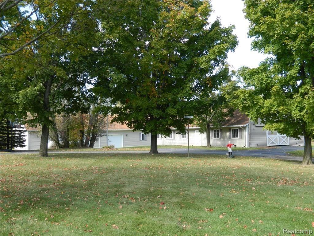 23113 Currie Road South Lyon, MI 48178 - Photo 10 of 49 Horse barn and garage