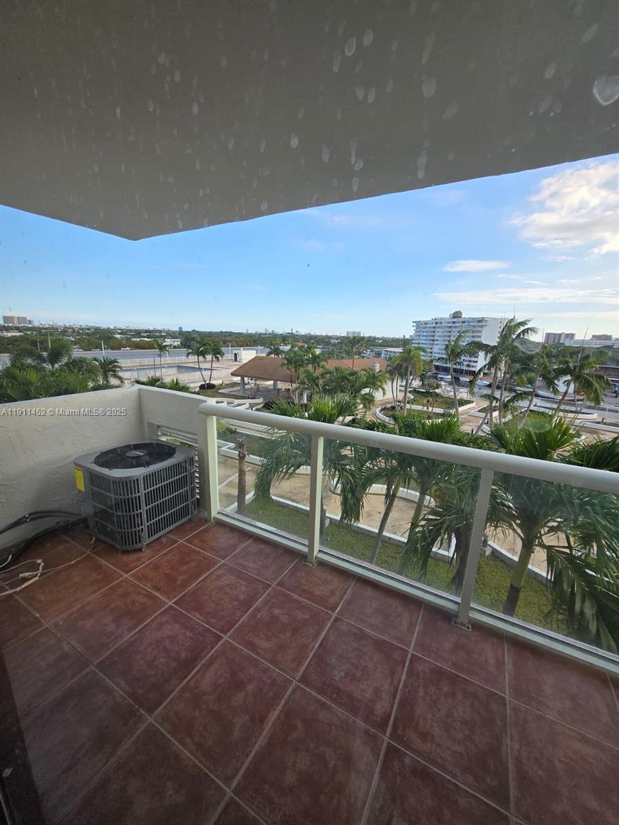 13499 Biscayne Boulevard, Unit 604 North Miami, FL 33181 - Photo 13 of 14 a view of a terrace with city view