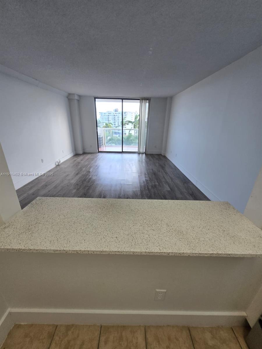 13499 Biscayne Boulevard, Unit 604 North Miami, FL 33181 - Photo 2 of 14 a view of an empty room and window
