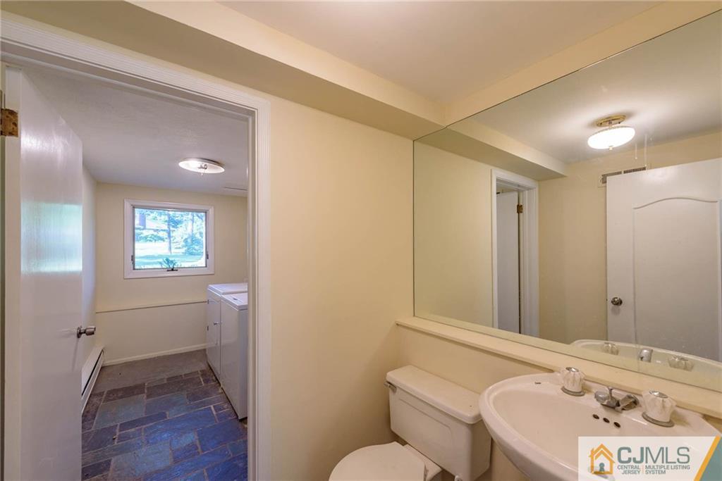 565 Foothill Road Bridgewater, NJ 08807 - Photo 21 of 25 a bathroom with a sink a toilet and shower