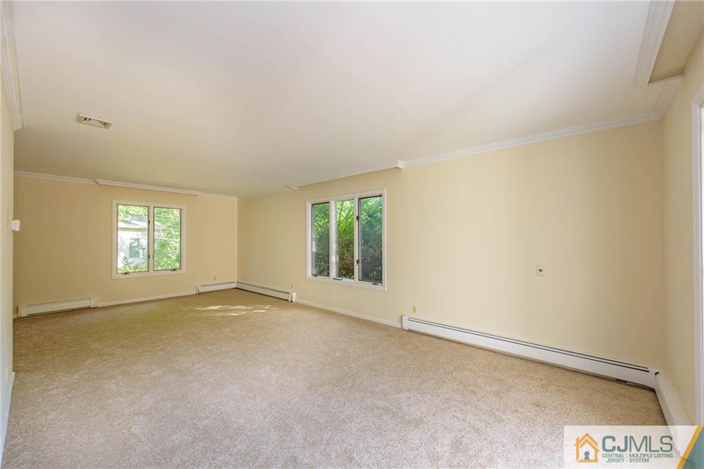 565 Foothill Road Bridgewater, NJ 08807 - Photo 10 of 25 an empty room with windows