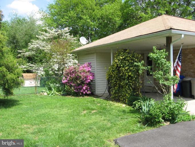 19113 Bloomfield Road Olney, MD 20832 - Photo 19 of 20 Side View of Carport/Yard