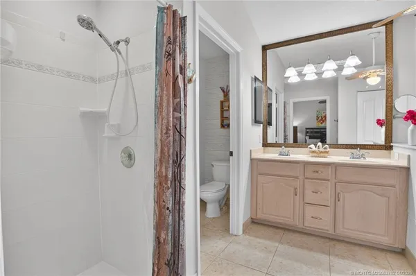 a bathroom with a sink and a window