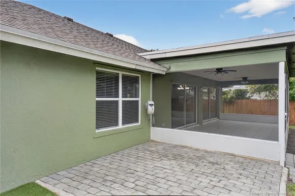 an aerial view of a house with a garden