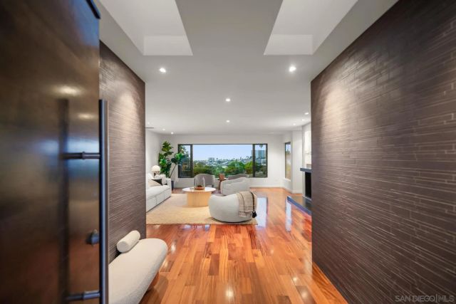a view of a living room and dining room