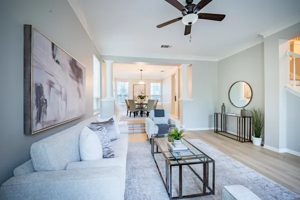 a living room with furniture and a window