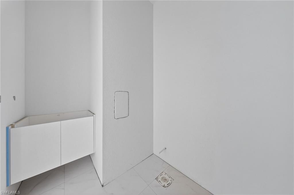 1213 Dodwin Street East Lehigh Acres, FL 33974 - Photo 15 of 28 a view of bathroom