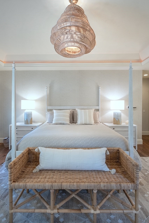 5 Pasture Road Bourne, MA 02534 - Photo 14 of 37 a bedroom with a bed and a mirror