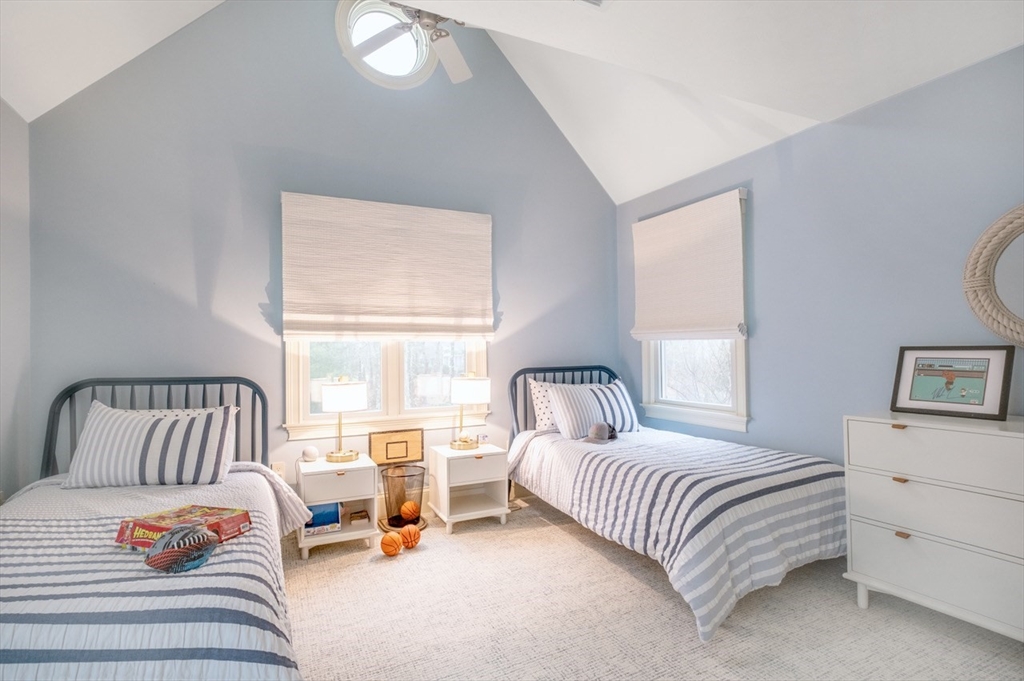 5 Pasture Road Bourne, MA 02534 - Photo 18 of 37 a bedroom with furniture and a large window