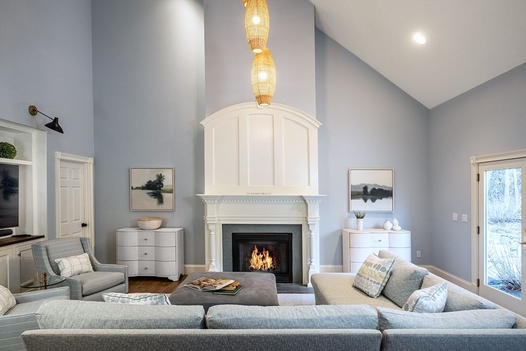 5 Pasture Road Bourne, MA 02534 - Photo 5 of 37 a living room with furniture and a fireplace