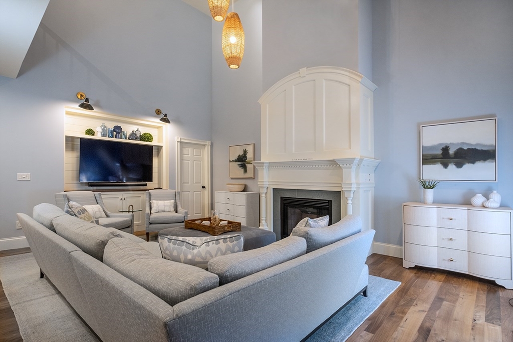 5 Pasture Road Bourne, MA 02534 - Photo 6 of 37 a living room with furniture and a fireplace