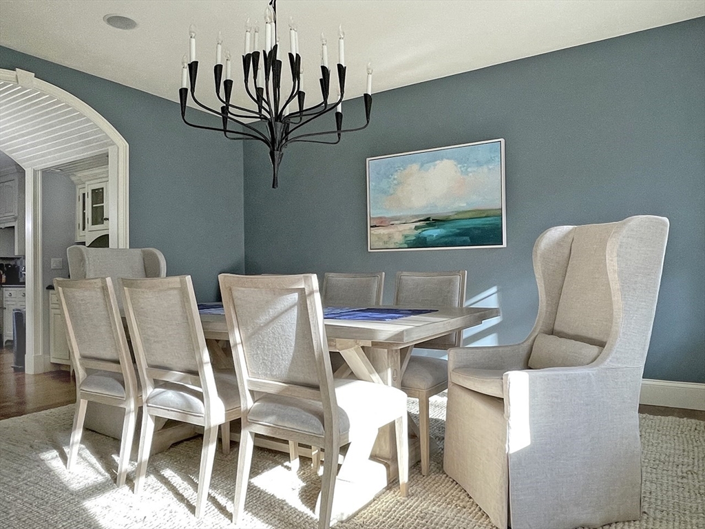 5 Pasture Road Bourne, MA 02534 - Photo 8 of 37 a view of a dining room with furniture and wooden floor