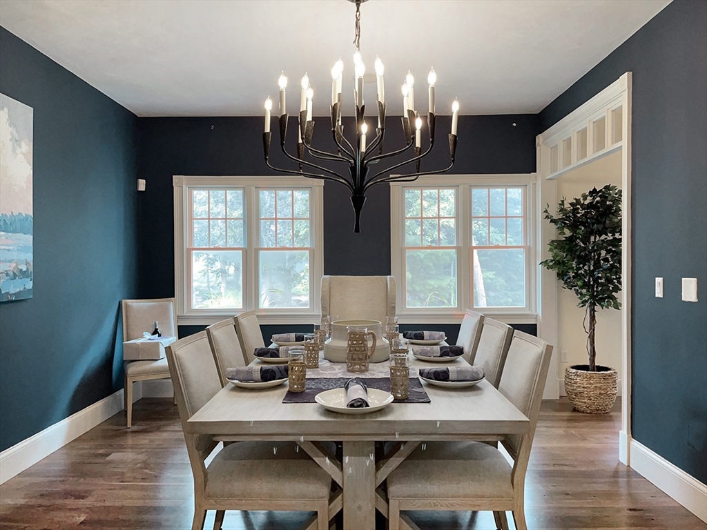 5 Pasture Road Bourne, MA 02534 - Photo 9 of 37 a view of a dining room with furniture window and wooden floor