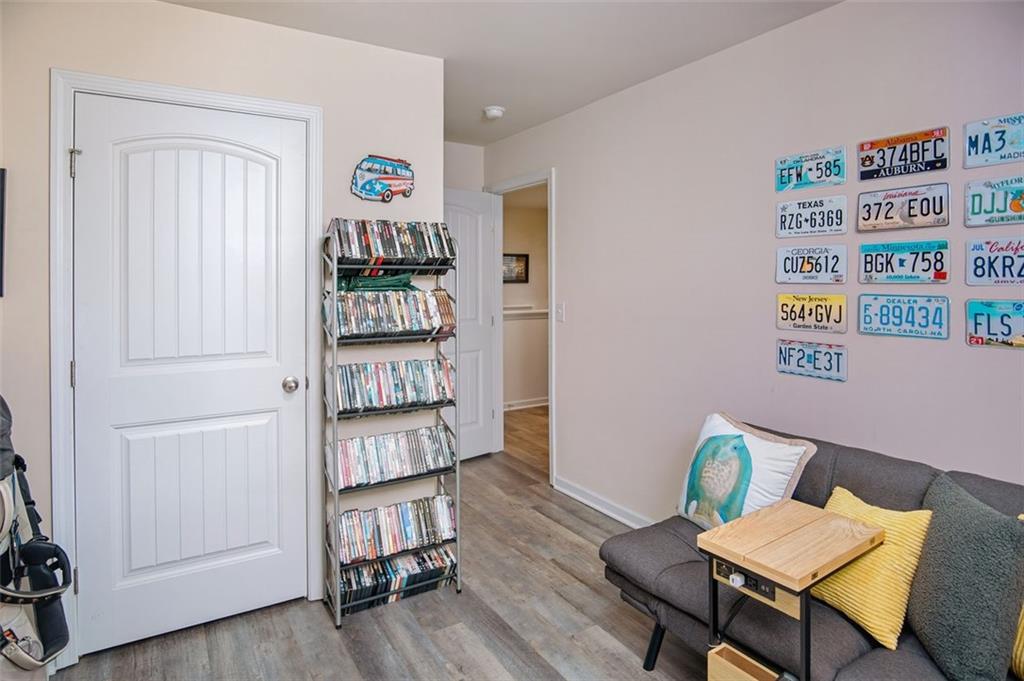 132 Centennial Ridge Drive Acworth, GA 30102 - Photo 19 of 38 a view of a livingroom with furniture and wooden floor